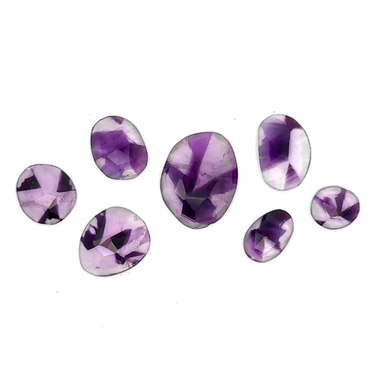 Suite of Rose Cut Amethysts Displaying Natural Color Zoning